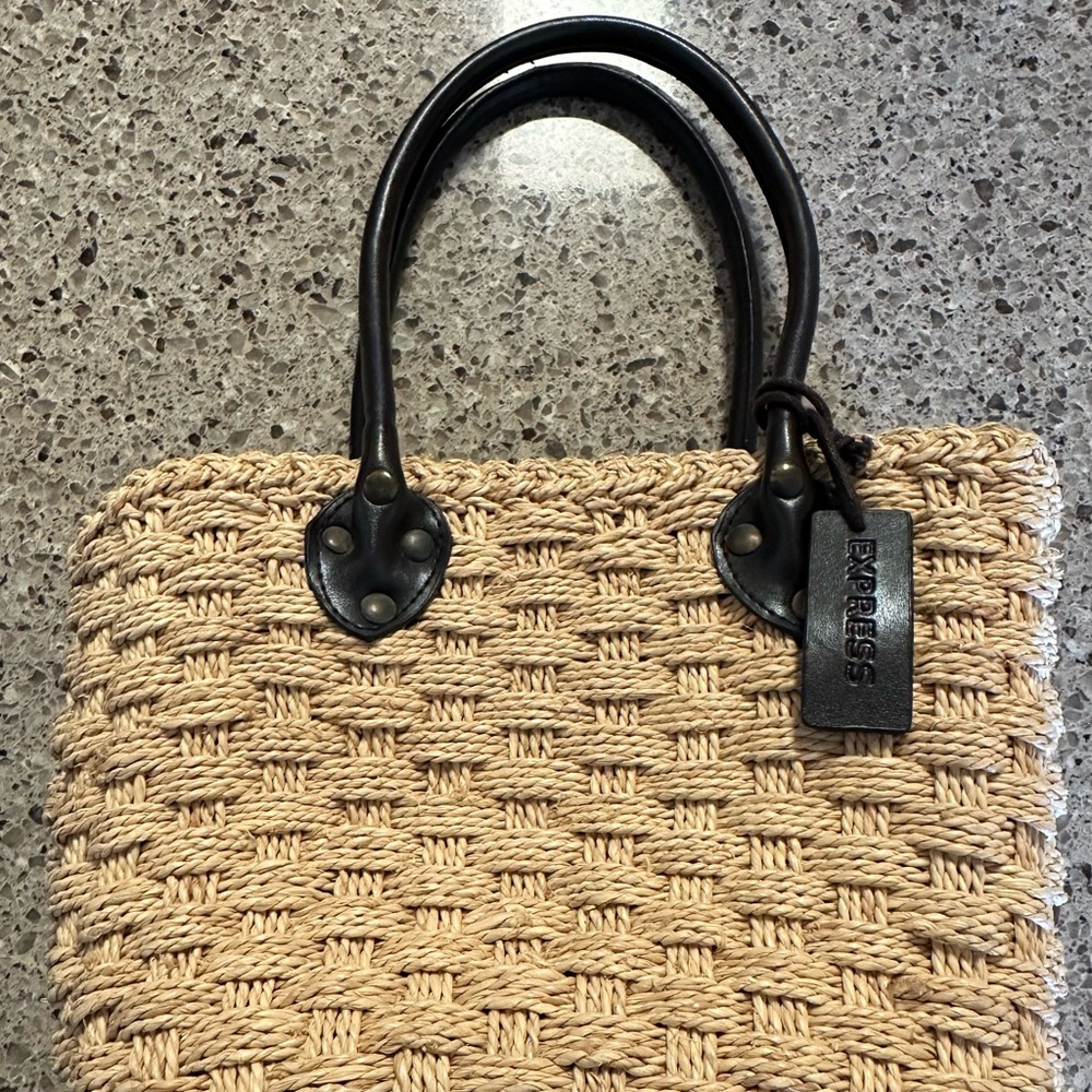 Express straw tote with cheetah print.